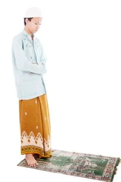Devout muslim man praying Stock Photos