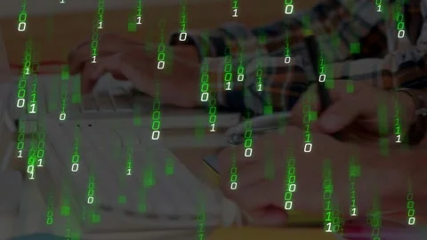 Devs typing, sketching on tablet, typing initiating green binary overlay across Stock Footage 333132024