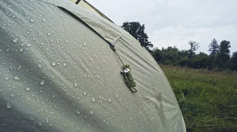 Dew on a rainy day in a tent in a forest glade 스톡 동영상 65077879