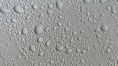 Dewdrops fall on the metal surface Stock-Fotos