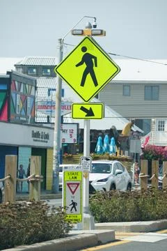 Dewey Beach, Delaware, U.S.A - August 5, 2023 - A yellow crossing line with.. Stock Photos