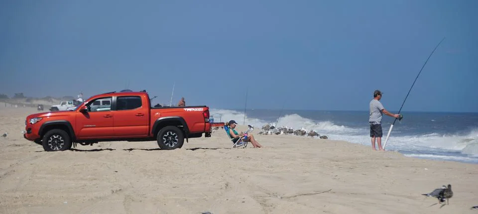Dewey Beach, Delaware, U.S.A - September 21, 2021 - A red pick-up truck with  Stock Photos