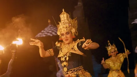 Dewi Sinta performs the Kecak dance in front of male dancers, Bali Video stock 261801098