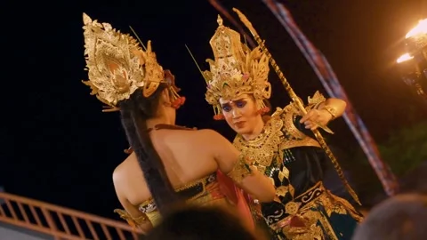 Dewi Sinta performs the Kecak dance in front of male dancers, Bali 動画素材 261801803