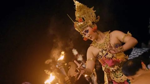 Dewi Sinta performs the Kecak dance in front of male dancers, Bali 動画素材 261802534