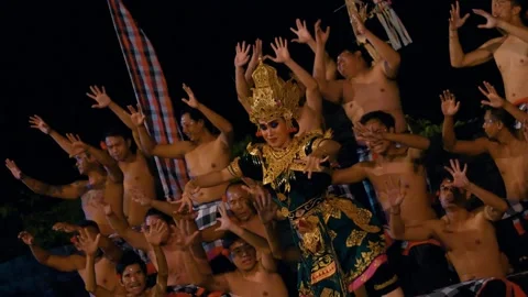 Dewi Sinta performs the Kecak dance in front of male dancers, Bali, Indonesia 動画素材 261851119