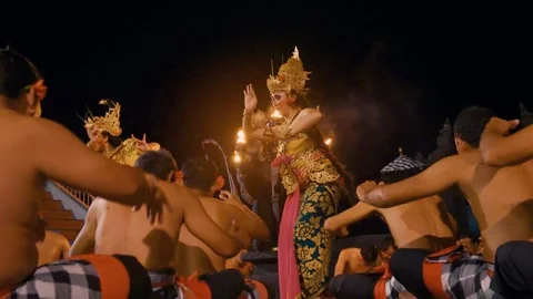 Dewi Sinta performs the Kecak dance in front of male dancers, Uluwatu, Bali Vídeos de archivo 261855293