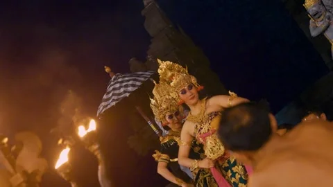 Dewi Sinta performs the Kecak dance in front of male dancers, Uluwatu Temple 動画素材 261855675
