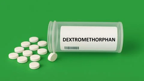 DEXTROMETHORPHAN plastic box of medication with pills Stock-Fotos