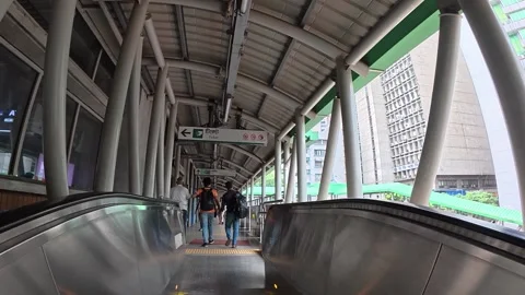 Dhaka Metro Rail Station Interior with Passengers on Escalator Stock Footage 341860574
