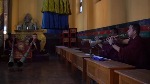 DHARAMSHALA, INDIA - 2020, OCT 13: Monks Playing Gyaling Oboe in Prayer Hall Stock Footage 208902224