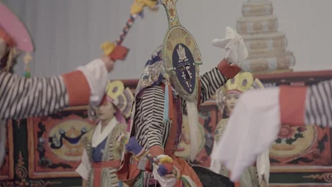 DHARAMSHALA, INDIA - MAY 20, 2026: Tibetan Ache Lhamo Performer in Hunter Mask Stock Footage 345632575
