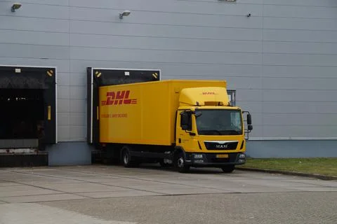 DHL delivery truck at a loading dock Stock Photos
