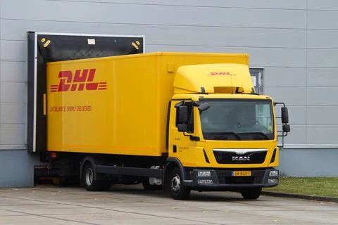 DHL delivery truck at a loading dock Stock Photos