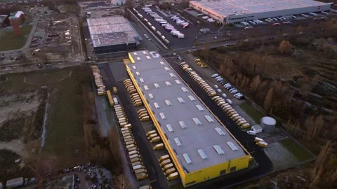 DHL Deutsche Post logistics center berlin city. Smooth aerial view drone Stock Footage 322704167