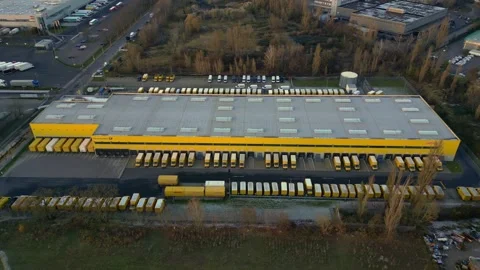 DHL Deutsche Post logistics center berlin city. Lovely aerial view drone Stock Footage 322704201