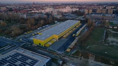 DHL Deutsche Post logistics center berlin city. Gorgeous aerial view drone Stock Footage 323416523
