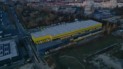 DHL Deutsche Post logistics center berlin city. Fantastic aerial view drone Stock Footage 323416526