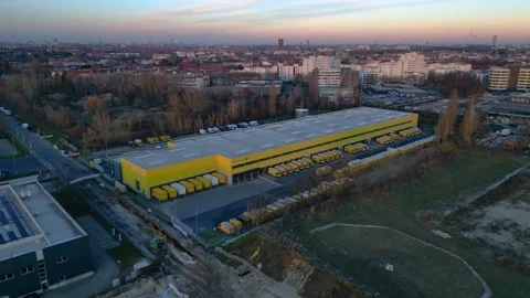 DHL Deutsche Post logistics center berlin city. Majestic aerial view drone Stock Footage 323416540