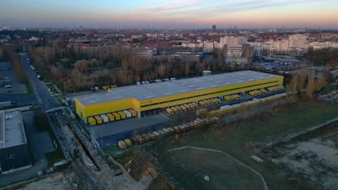 DHL Deutsche Post logistics center berlin city. Beautiful aerial view drone Stock Footage 323416585
