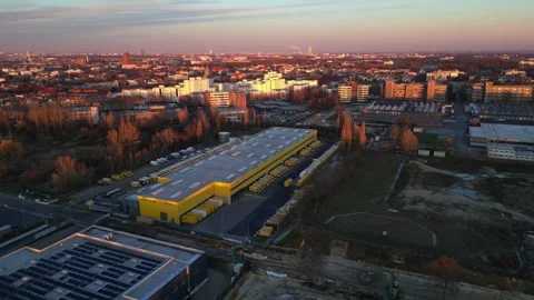 DHL Deutsche Post logistics center berlin city. Dramatic aerial view drone Stock Footage 323416596