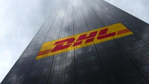 DHL Express logo on a skyscraper facade reflecting clouds. Editorial 3D Stock Illustration