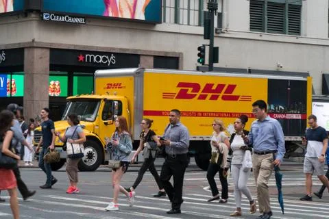 DHL global express transit package courier service Stock Photos