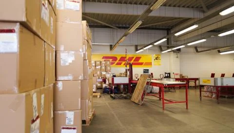 DHL warehouse with package boxes of different size Stock Photos
