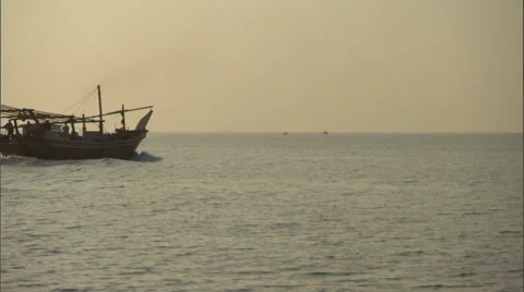 A dhow boat sails on the water. Stock Footage 46868878