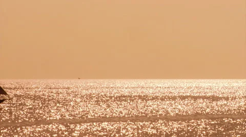 Dhow on Indian Ocean silhouetted by sunset light, Tanzania Stock Footage 59229708