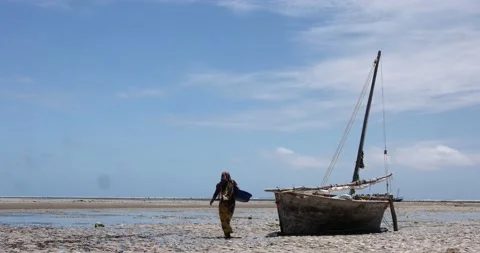 Dhow sit on the beach Stock Footage 158879980