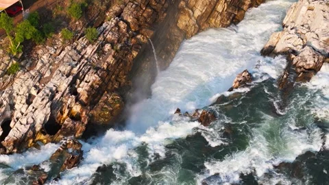 Dhuandhar-waterfall-drone-tilt-down-bhedaghat-jabalpur-india.mp4 Stock Footage 340393660