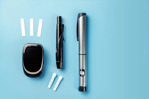 Diabetes testing kit bloos glucose meter, blood test strips and gauge lancets Stock Photos
