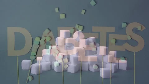 Diabetes Text With Falling Sugar Cubes Concept Stock Footage 336492004