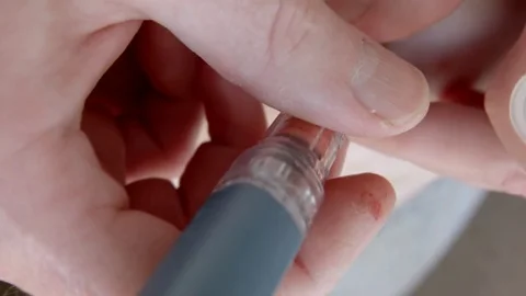 Diabetic giving injection Stock Footage 71144476