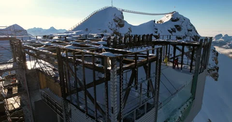 Diablerets burned arrival building being repaired - Aerial 4K Stock Footage 224862567