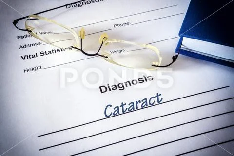 Diagnosis list with cataratc. Eye disorder concept. Stock Photos