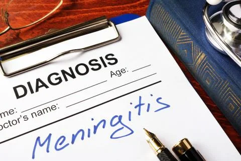 Diagnosis Meningitis written in a document on a table. Stock-Fotos