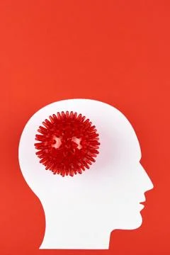 Diagnostics concept with strain virus model and human's head - on red background Stock Photos