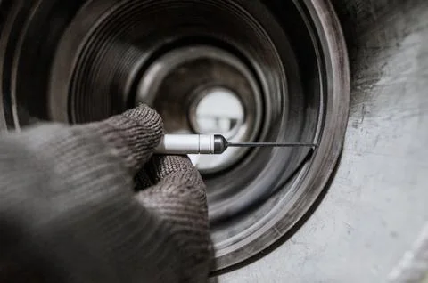Diagnostics of the quality of the pipe for drilling Stock Photos