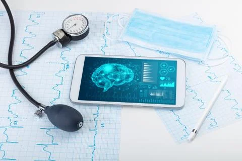Diagnostics on tablet with brain functionality concept Stock Photos