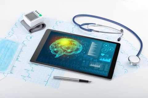 Diagnostics on tablet with brain functionality concept Stock Photos