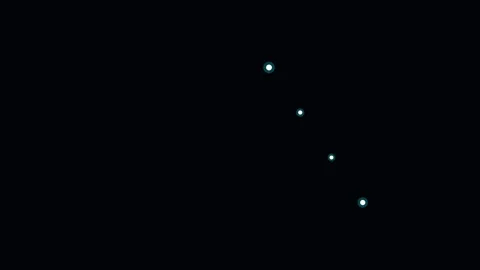 A diagonal arrangement of four glowing white circles on a black background Stock Footage 338311400