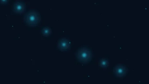 A diagonal arrangement of glowing blue circular light orbs on dark background 库存影片 338309910