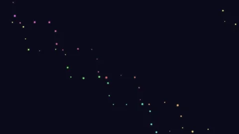 A diagonal arrangement of glowing multicolored circles against dark background Video stock 335118260