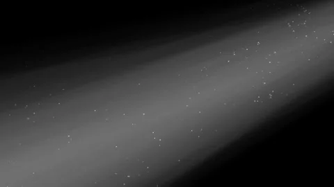 Diagonal beam of light filled with tiny stars against a dark background Stock Footage 283066849