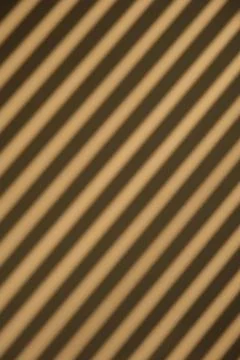 Diagonal brown striped pattern background, texture close up Stock Photos