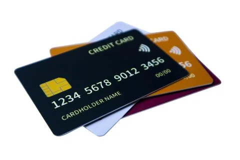Diagonal close-up perspective of overlapping multi-colored credit and debit.. Stock Photos