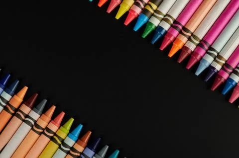 Diagonal copy space between crayons Stock Photos