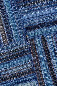 Diagonal denim fabric pattern in patchwork style. Foto stock